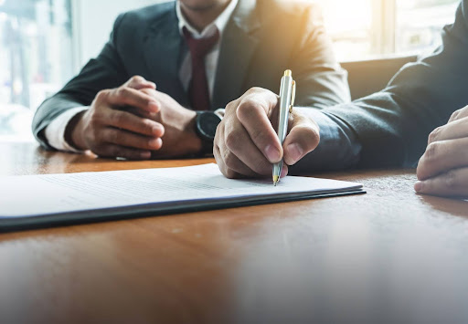 Man meeting with lawyer to discuss a prostate cancer misdiagnosis case